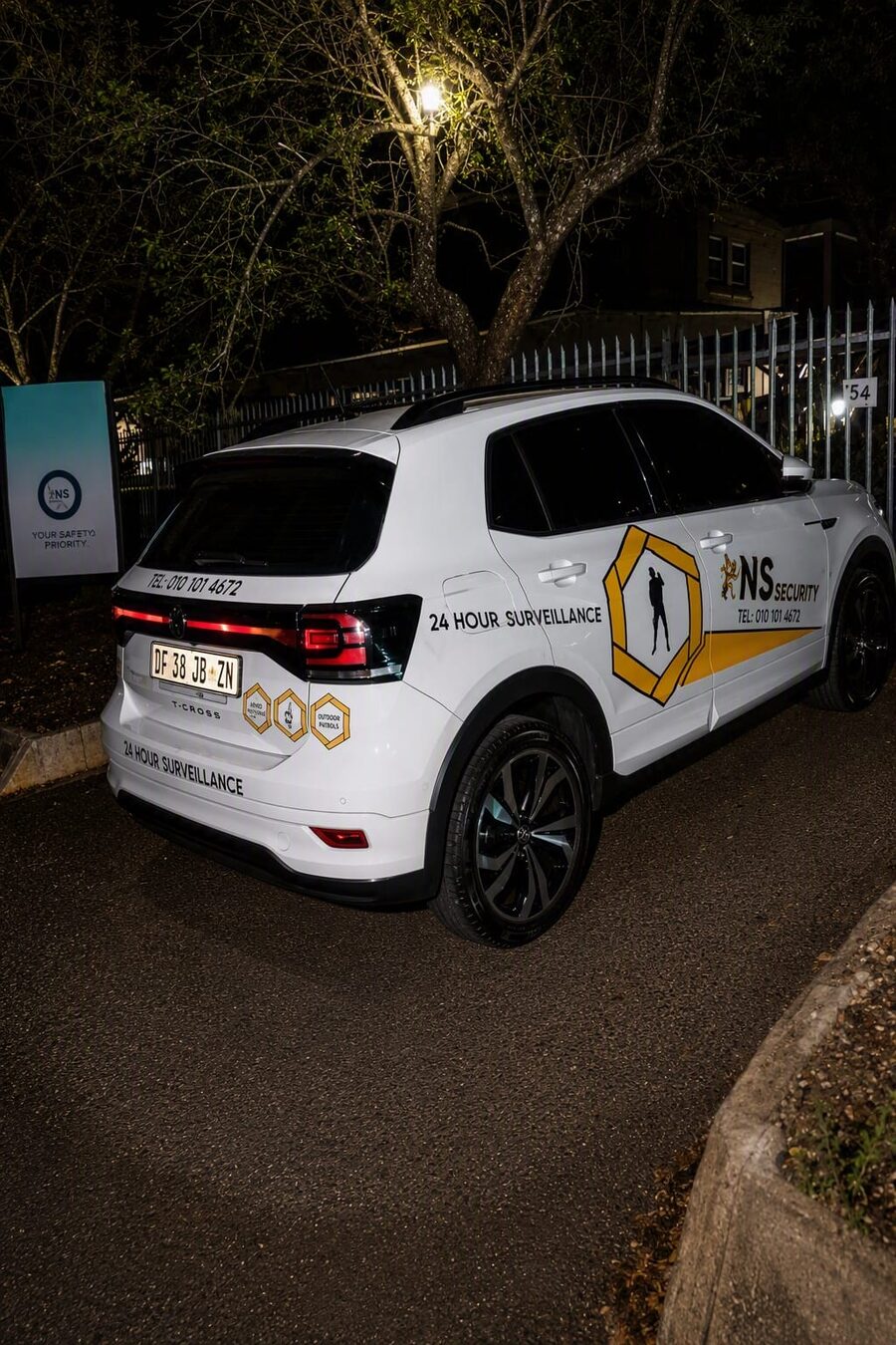 NS Security 24-hour surveillance patrol vehicle at night